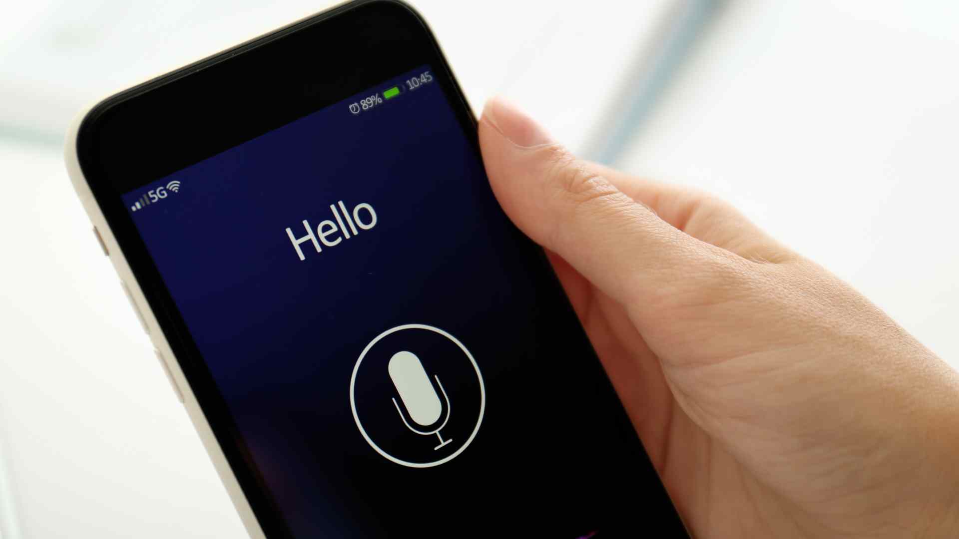 A person making a conversational ai voice search on a mobile phone.