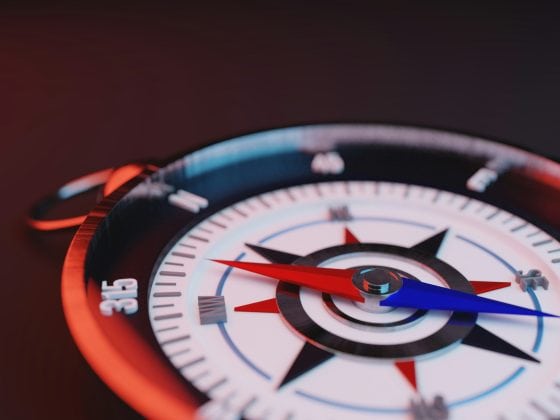 A compass for navigating AI and Generatvie Engine Optimisation (GEO) on a black background.